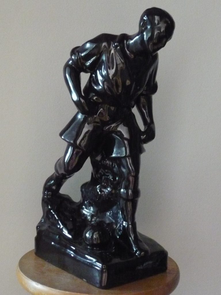 Football player figurine Image